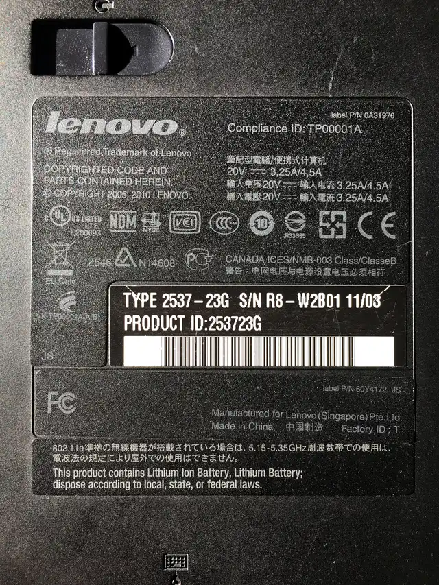Type label under a Lenovo ThinkPad laptop, where the serial number is printed